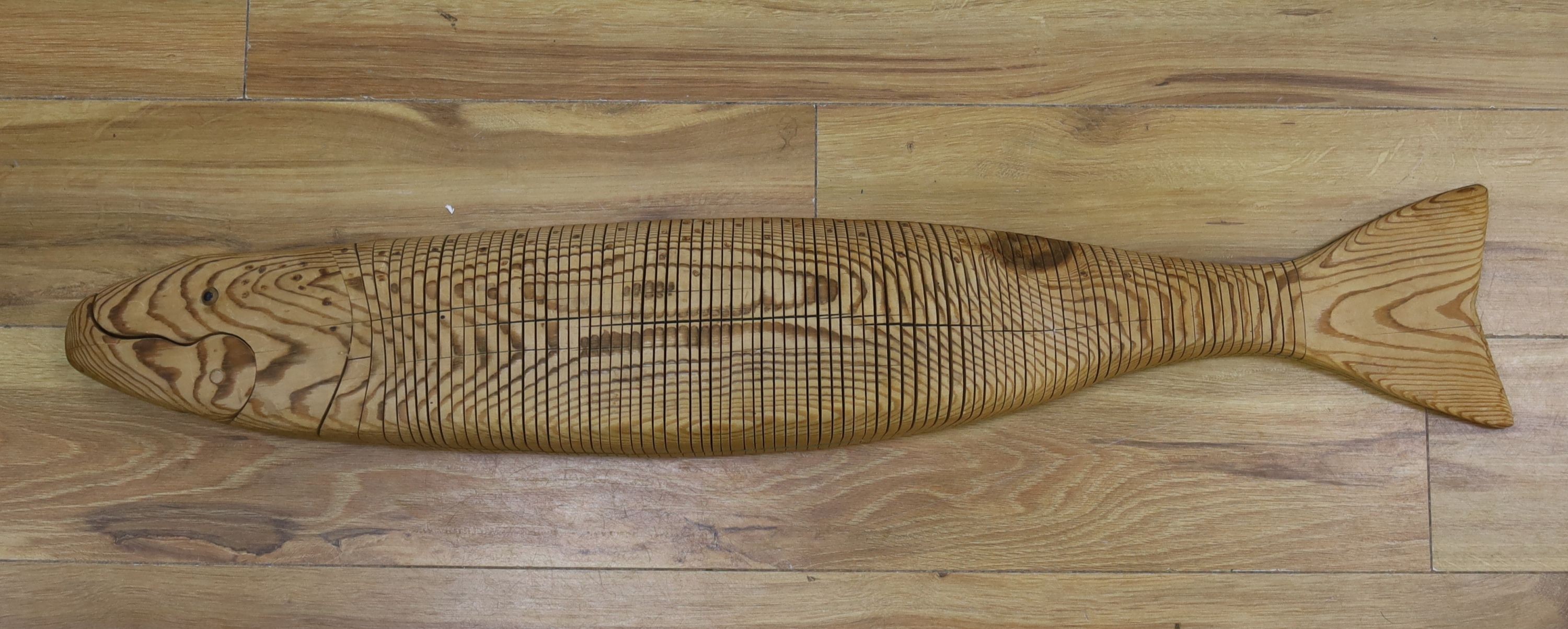 A large articulated pine model of a pike, 98cm